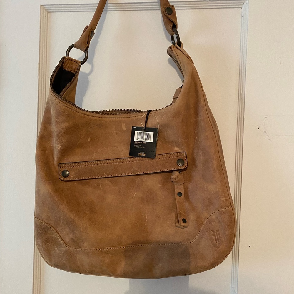 Beautiful Frye purse, never used, I paid the price it shows 398. - Picture 4 of 6